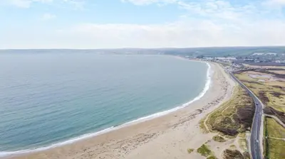 an aerial view of a beach and the ocean at 3 Bed in Marazion oc-m30668 in Marazion