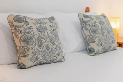 two pillows sitting on top of a bed at 2 Bed in St. Ives oc-b31979 in St Ives