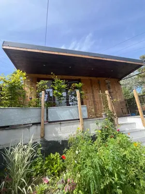 a house with a garden in front of it at Treth Newquay in Newquay