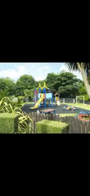 a playground with a slide in a park at Perfect place for family time in Hayle