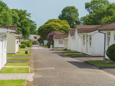 a street of houses in a residential neighbourhood at Chalet The Birches by Interhome in Liskeard