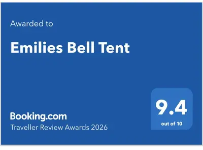 a blue sign with the words emulsils bell term at Emilies Bell Tent in St Ives