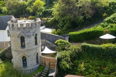 an overhead view of a castle with an umbrella at Castle by the Beach with Sea Views Portreath in Redruth