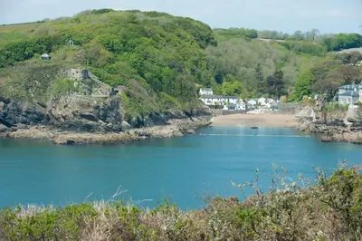a view of a river with houses on a hill at Bessie Ellens Cottage - 1 Pet Welcome - Central Location - Free WiFi in Fowey