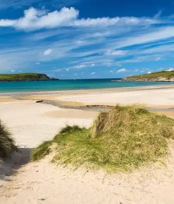 a sandy beach with the ocean in the background at Seabreeze Cottage in Padstow