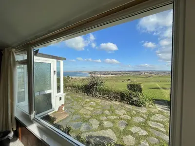 a window view of the countryside from a house at 2 The Links in St Ives