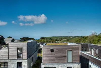a view of some buildings in a city at House 23 in Looe