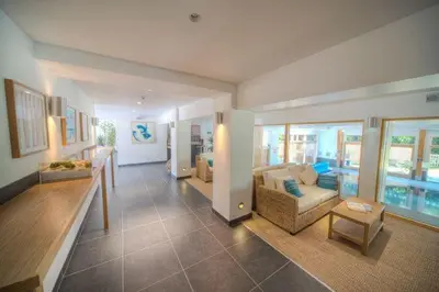 a living room with a couch and a table at House 47 in Talland