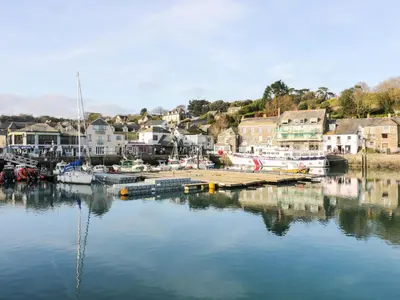 a marina with boats in the water and houses at Lodge 9 - Lamorna in Padstow