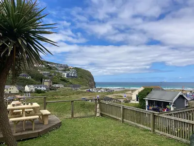 a view of the ocean from the balcony of a house at 'The Dunes', Porthtowan in Porthtowan