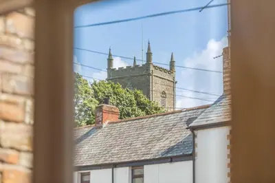 a view from a window of a building with a tower at 2 Bed in St. Issey oc-a32428 in Saint Issey