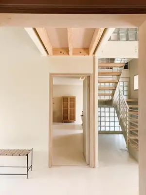 a view of a hallway with a staircase in a house at The Architects Treehouse in Mount Hawke