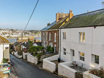 an aerial view of a street in a town with houses at 2 Bed in Fowey oc-91015 in Polruan