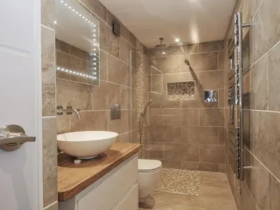a bathroom with a sink and a toilet at Beach Retreat in Looe