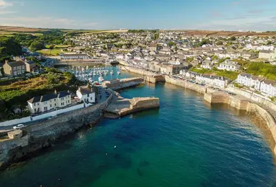 an aerial view of a town and a river at Acton Castle in Praa Sands