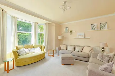 a living room with two couches and a couch at Finest Retreats - Lansdowne in Falmouth