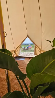 a large tent with a view of the beach at Tiny Treamble in Cubert