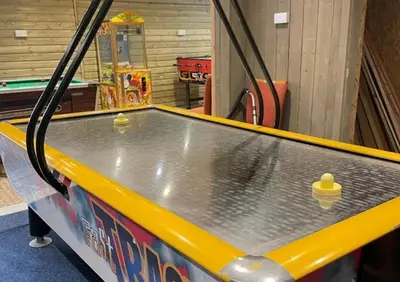 a ping pong table with two ping pong balls on it at 5Berth -Family Friendly -ParkingSpot -Heated Pool in St Austell