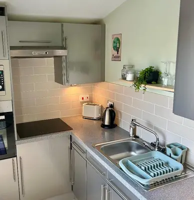 a kitchen with a sink and a counter top at 204 Atlantic Bays, St Merryn in St Merryn