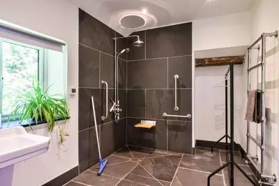 a bathroom with a shower and a sink at Finest Retreats - The Old Vicarage in Talland