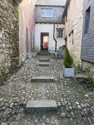 a stone walkway in front of a building at Merchants House in Penryn