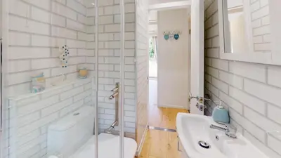 a bathroom with a toilet and a sink at St Ives Kornel Hewel 2 Bedrooms in St Ives