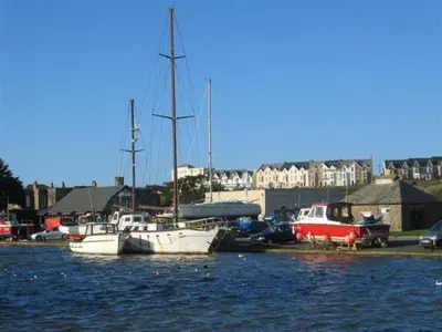 a couple of boats docked in a harbor at Copper Meadow in Launceston