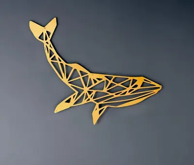 a wooden animal shaped like a whale on a table at Penheyl, Tregonce near Padstow and Sea in St. Issey