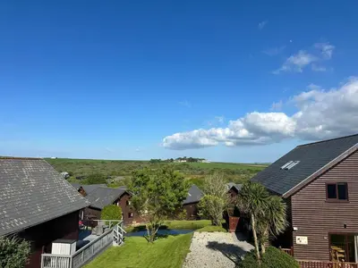 an aerial view of a house with a yard at 5A Retallack Resort & Spa in Saint Columb Major