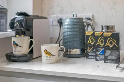 a counter with three coffee cups on a counter top at 4 Bed in Padstow oc-r32776 in Padstow