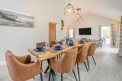 a dining room with a table and chairs at 4 Bed in Padstow oc-r32776 in Padstow