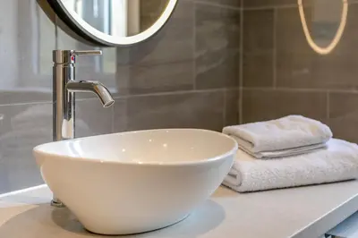 a white bowl sink sitting on a counter in a bathroom at 4 Bed in Padstow oc-r32776 in Padstow