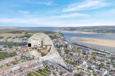 an aerial view of a house with a view of a city at 3 Bed in Padstow oc-g32860 in Padstow