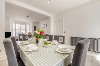 a dining room with a table and chairs at 3 Bed in Padstow oc-g32860 in Padstow