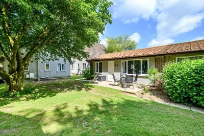 a house with a yard with a tree at 2 Bed in St. Tudy oc-m32233 in Saint Tudy