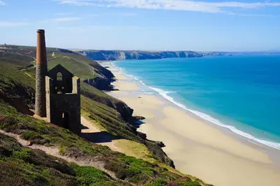 an old building on a hill next to the beach at 1 Bed in Four Lanes oc-b32769 in Carnbrea