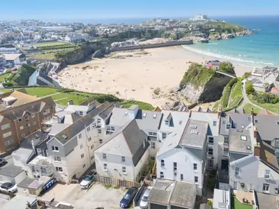 an aerial view of a beach and houses at 3 Bed in Newquay oc-o32259 in Newquay