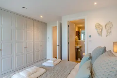a bedroom with a bed with towels on it at 3 Bed in Padstow oc-w28313 in St Merryn
