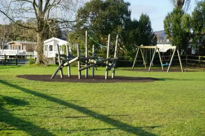 a park with a playground with a slide at Sarahs Retreat in Par