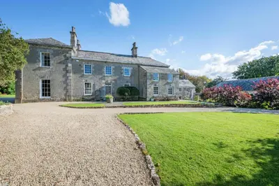 an old stone house with a large yard at 8 Bed in Tresillian oc-t32986 in Newlyn East