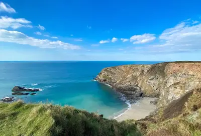 a view of the ocean from a cliff at The Gatehouse Apartment in Portreath