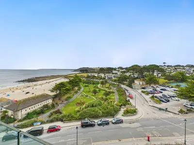 an aerial view of a parking lot next to a beach at Skydeck at The Liner – Stylish 2-Bed / 2-Bath Top Floor with Panoramic Sea Views in Falmouth