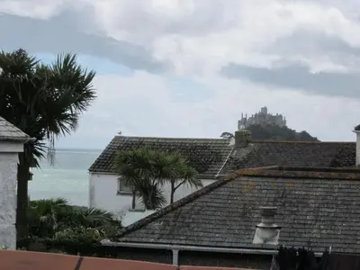 a view of the ocean from the roofs of houses at Jowders Cottage in Marazion