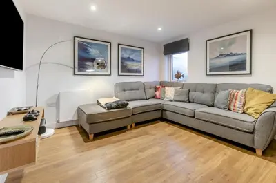 a living room with a couch and a table at 3 Bed in Carbis Bay oc-p33004 in Carbis Bay