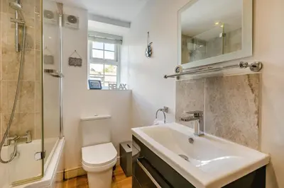 a bathroom with a sink and a toilet and a shower at 3 Bed in Sithney oc-cpv110 in Carleen