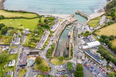 an aerial view of a construction site next to the water at Offshore, Coastal retreat, set in the heart of Charlestown in Charlestown