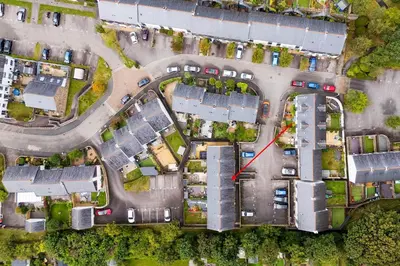 an aerial view of a suburb with houses at Offshore, Coastal retreat, set in the heart of Charlestown in Charlestown