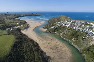 an aerial view of a beach and the ocean at Trevethen Cottage - Free Parking and WiFi - Close to Beach - Pets Welcome in Crantock