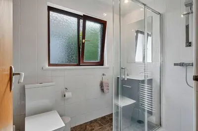 a bathroom with a toilet and a glass shower at Finest Retreats - Michel in Carbis Bay