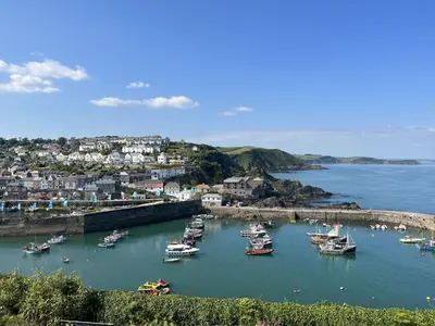 a group of boats docked in a harbor at Holiday Home Tregony House 2 Bedrooms by Interhome in Mevagissey